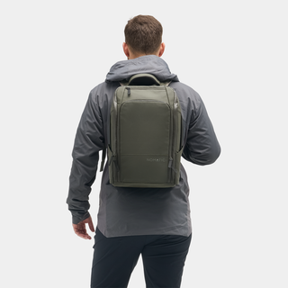 Nomatic Travel Pack 14L olive on model - lifestyle urban commute